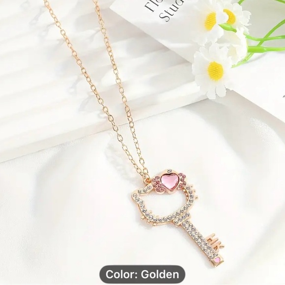 Elegant HELLO KITTY Gold Key Pendant Necklace with Pink Accents - Picture 8 of 13